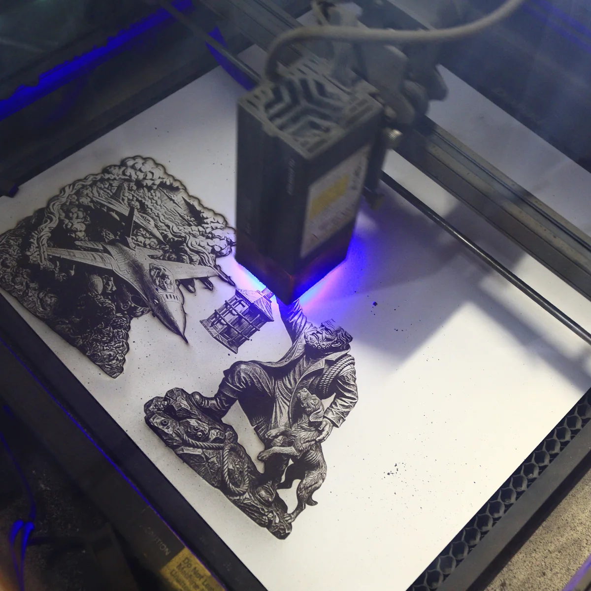 Two Studio designs engraving on a diode laser